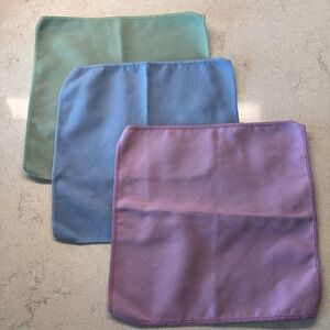 Norwex body cloths. Purple blue and green